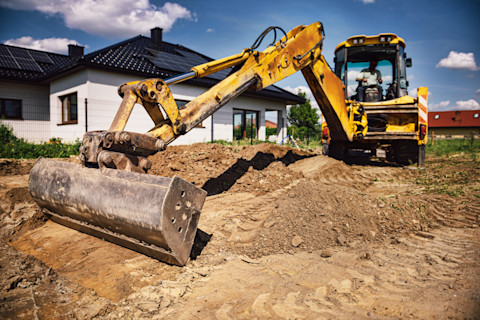 Bagger führt Aushubarbeiten durch